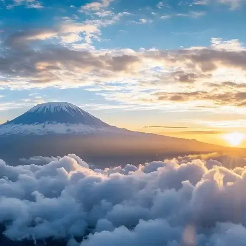 Aerial panorama of Mount Kilimanjaro Tanzania surrounded by clouds