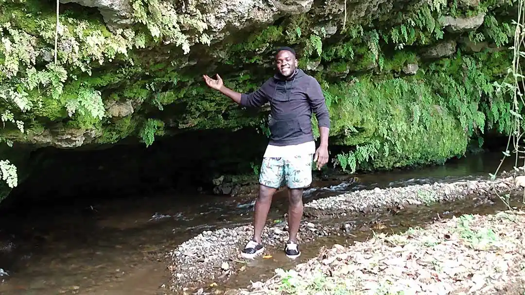River from Songota River with Joel under a cliff